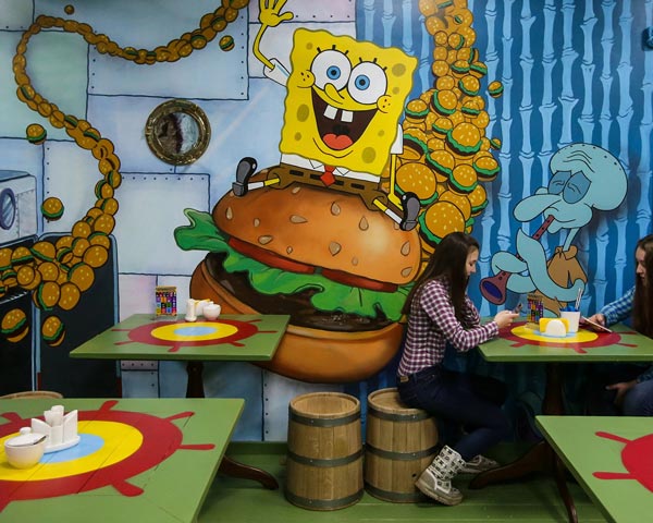 customers dining inside of the krusty krab